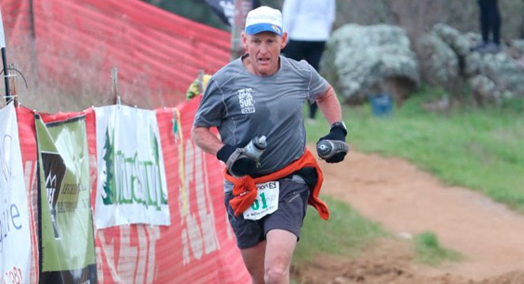 Bill Finkbeiner kicks for the finish at the 2017 Way Too Cool 50k. Photo by Keith Facchino.