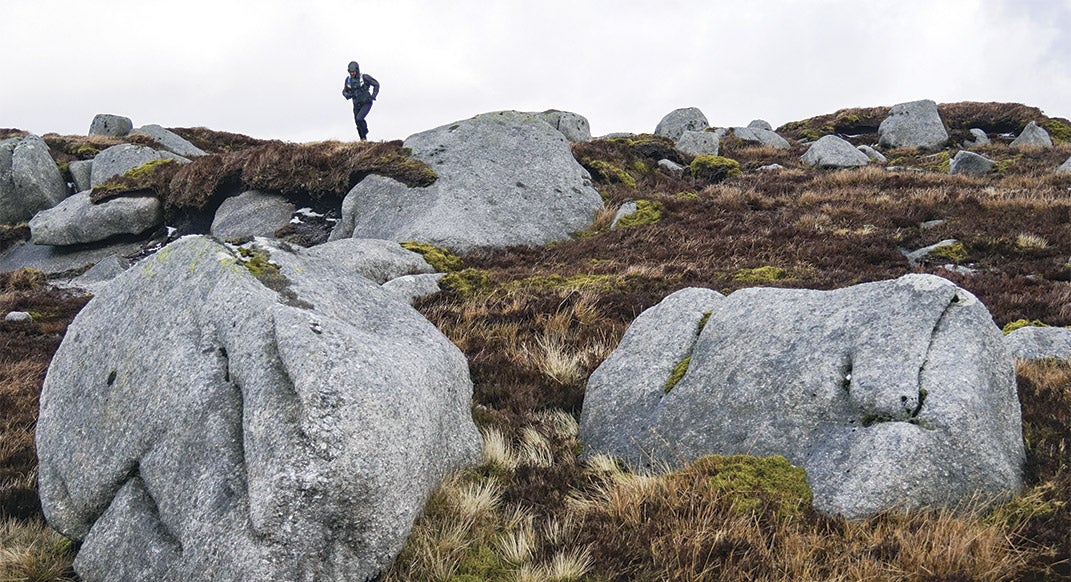 Scott Jurek crests a ridge in the Wicklow Mountains, south of Dublin. Photo by Rickey Gates.