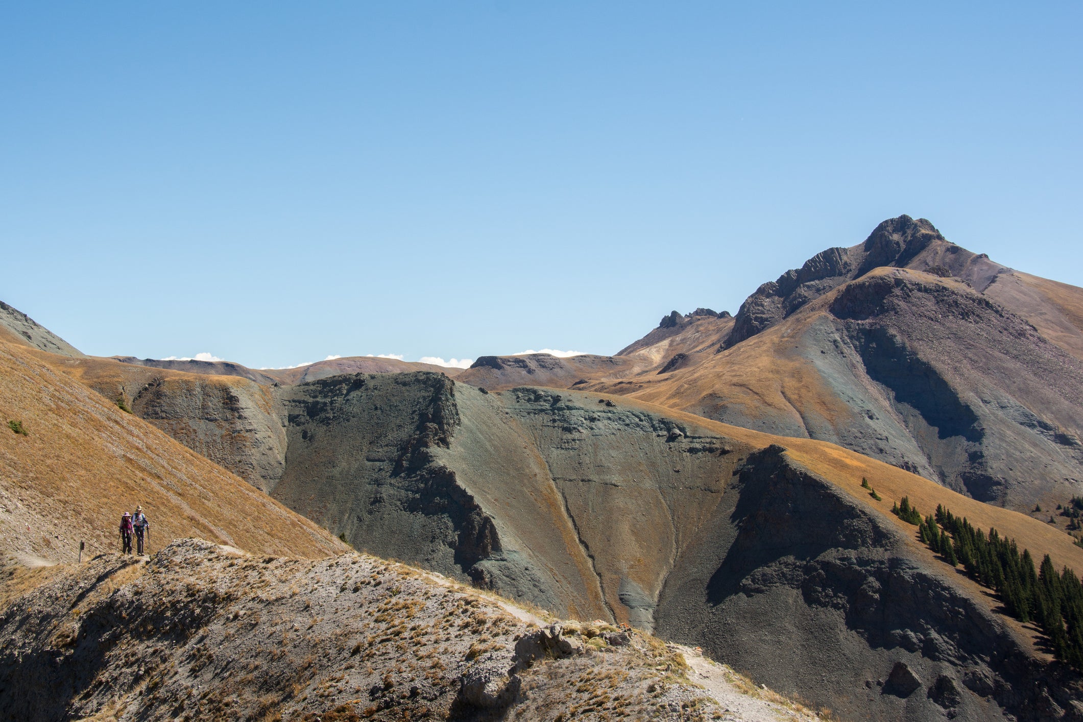 Bridge to Heaven is a hike that is located about 10 miles out of Ouray, Colorado, in the Uncompahgre National Forest.  The beginning is at the end of a 4WD single lane road.  After a climb through aspens and pines, it is a steep uhill to reach the top at over 12,000 ft. and cross the mountain bridge. The panoramic views make it a worthwhile trip.