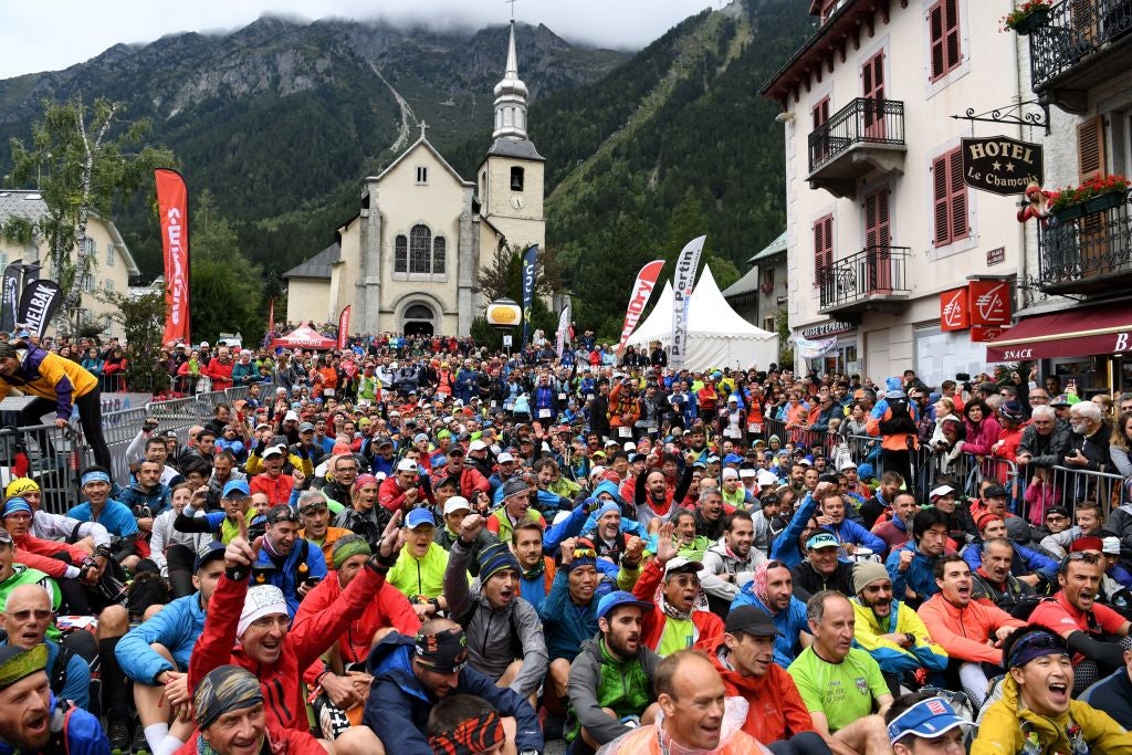 2300 runners wait for the start of the 170 km Mount Blanc Ultra Trail (UTMB) race around the Mont-Blanc crossing France, Italy and Swiss, on September 1, 2017 in Chamonix. - The 15 th Ultra-Trail du Mont-Blanc (UTMB) is a mountain ultramarathon with numerous passages in high altitude (>2500m) and in difficult weather conditions (night, wind, cold, rain or snow). It takes place once a year in the Alps, across France, Italy and Switzerland. (Photo by JEAN-PIERRE CLATOT / AFP) (Photo by JEAN-PIERRE CLATOT/AFP via Getty Images)